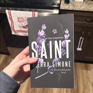 's 'Saint' with Black and Purple Floral Cover